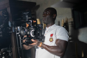 Pius Okaba holding RED camera